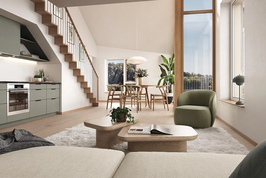 Åpen kjøkkenløsning med grønne skap, spiseplass og loftstue med store vinduer og utsikt.