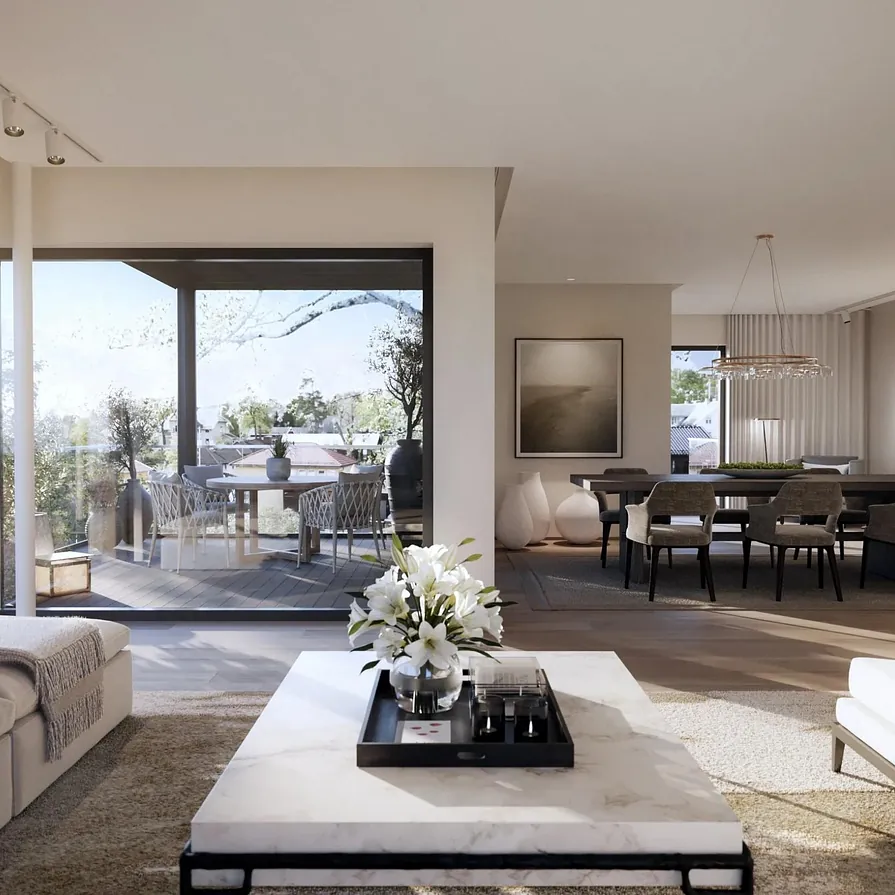 Lys og åpen stue med utsikt mot møblert terrasse, og spiseplass i harmonisk og moderne stil.